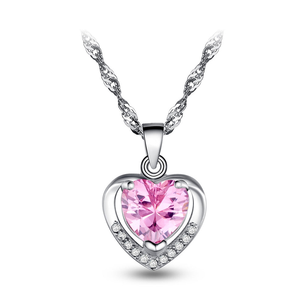 Halskæde i sølv med hjerte vedhæng med pink zirconia