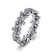 Sølv ring med blomster med stene