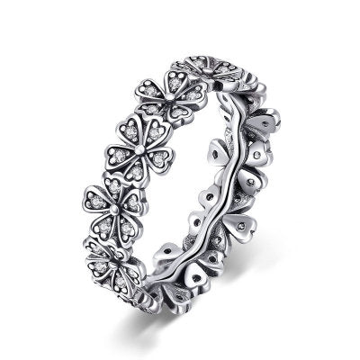 Sølv ring med blomster med stene