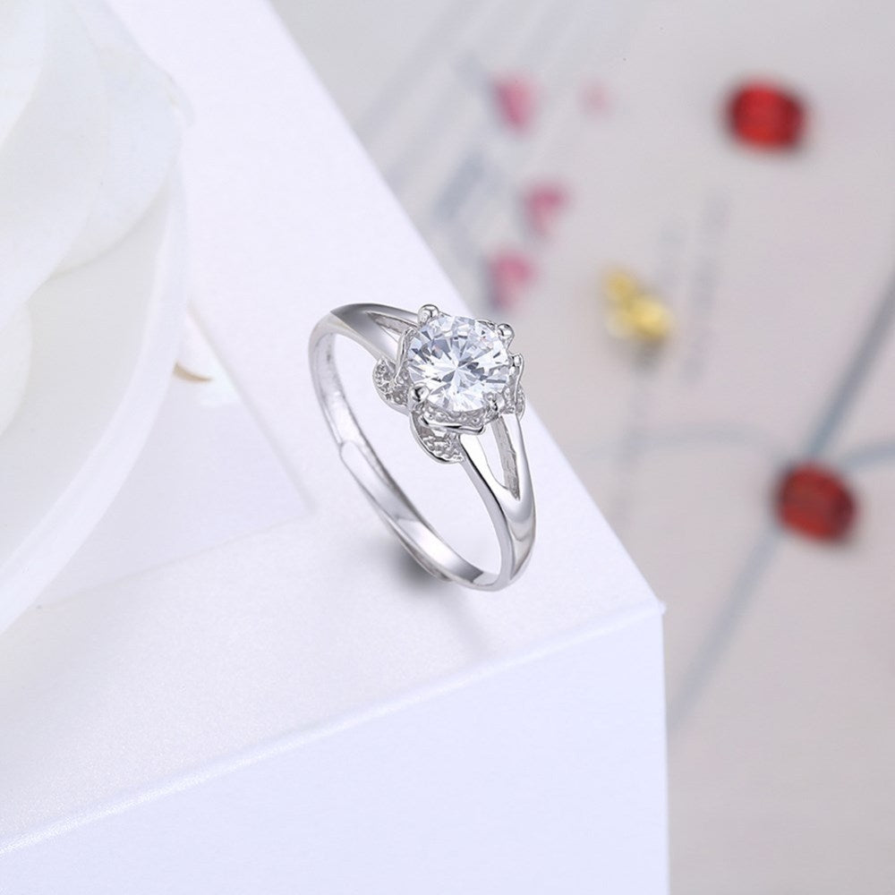 Sølv ring med blomst med zirconia sten