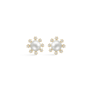 8 kt. guld ørestikker perle med 8 syntetiske cubic zirconia rundt om. Mål 7,64 x 7,64 mm.