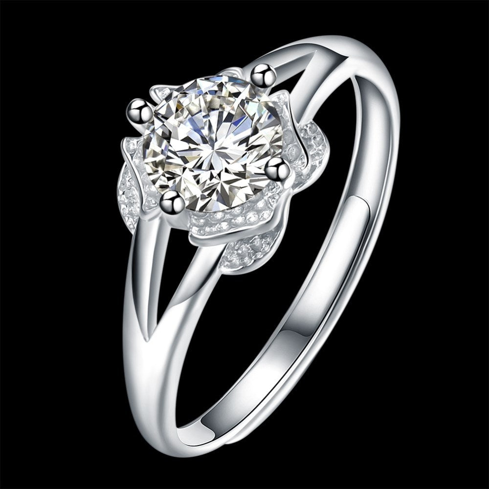 Sølv ring med blomst med zirconia sten