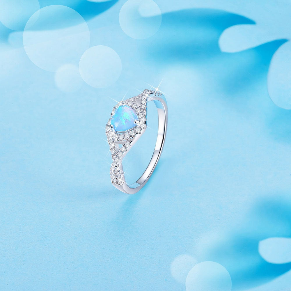 Sølv ring med opal hjerte og zirconia.