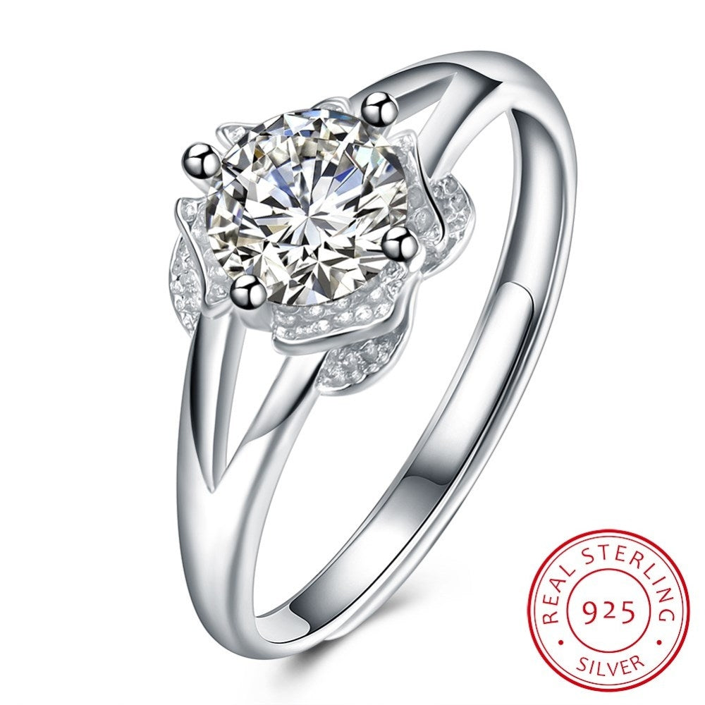 Sølv ring med blomst med zirconia sten