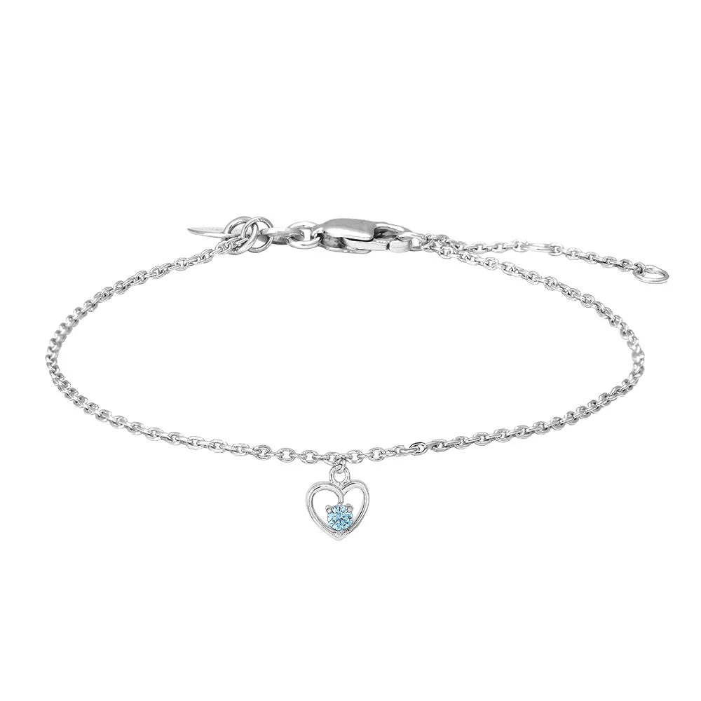Rod. silver bracelet heart w/light blue cz