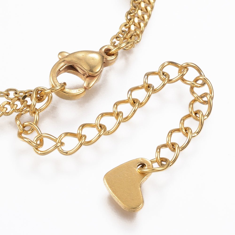 Ankelkæde i forgyldt rustfrit stål med vedhæng - Urma.dk