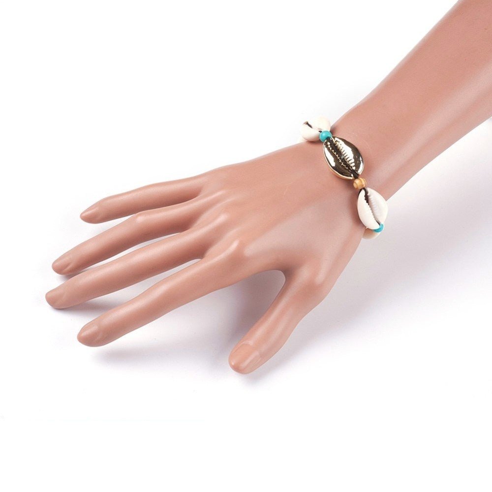 Armbånd med muslingeskaller, forgyldt - Urma.dk