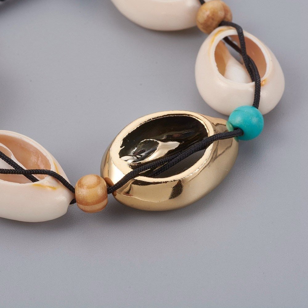 Armbånd med muslingeskaller, forgyldt - Urma.dk