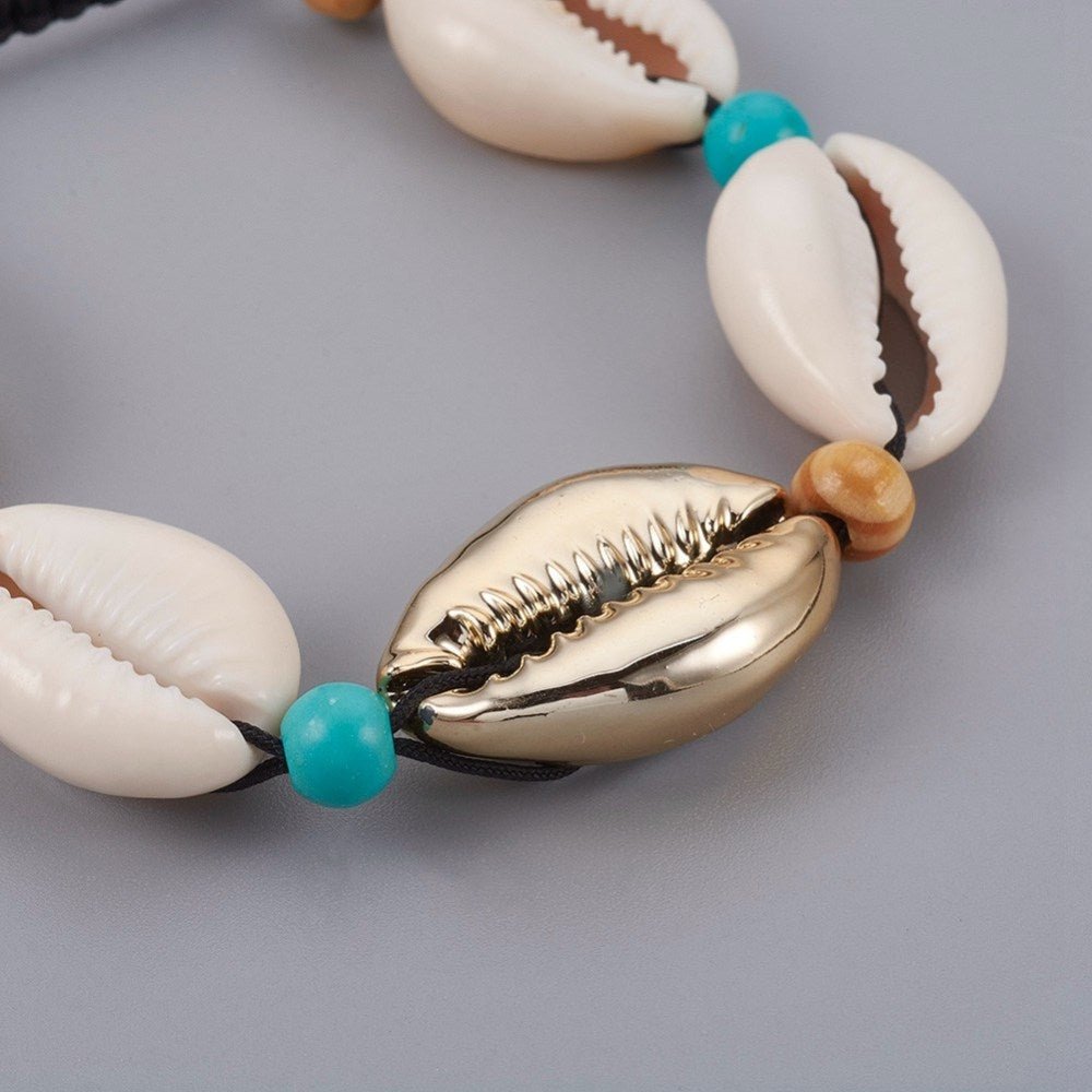 Armbånd med muslingeskaller, forgyldt - Urma.dk