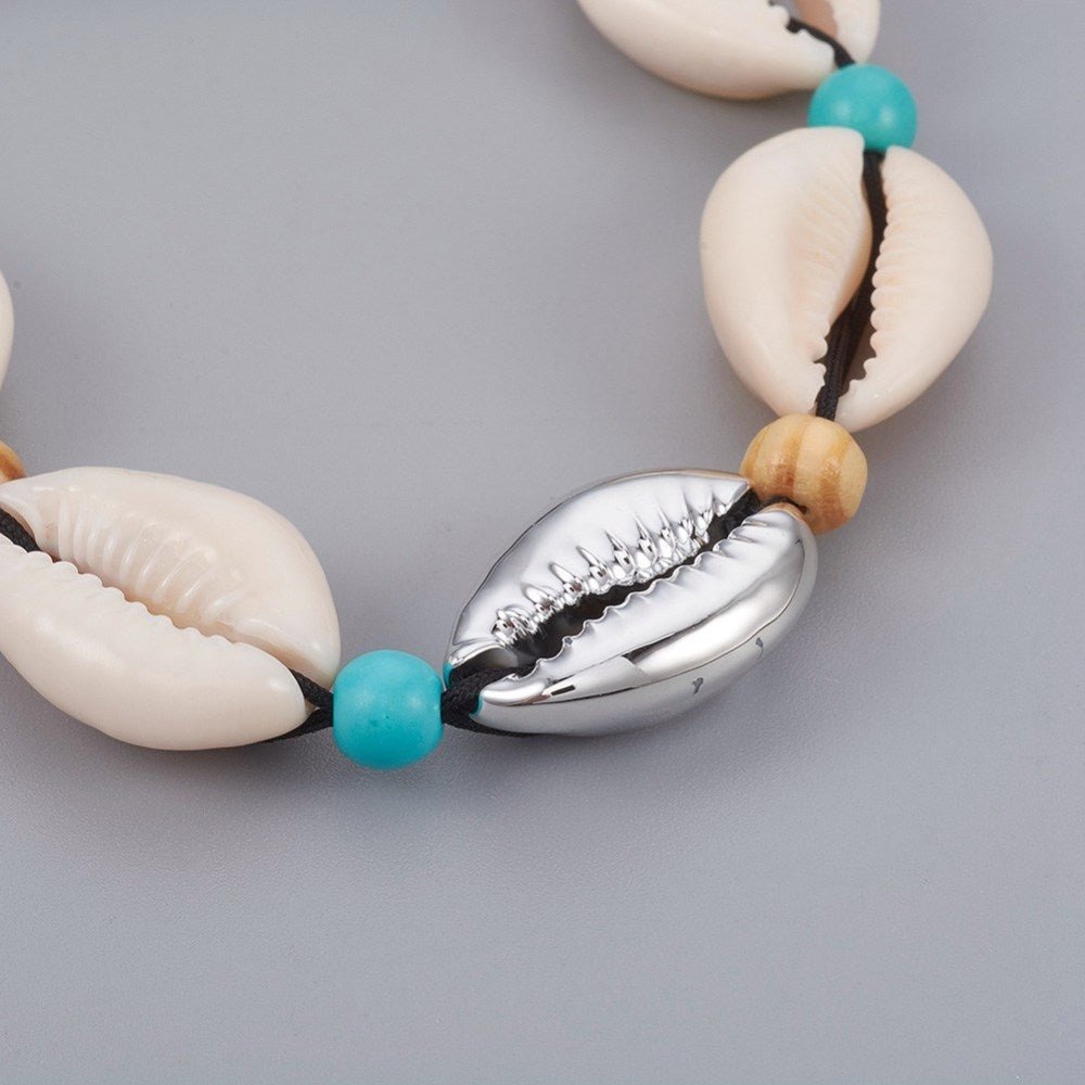 Armbånd med muslingeskaller, sølv - Urma.dk