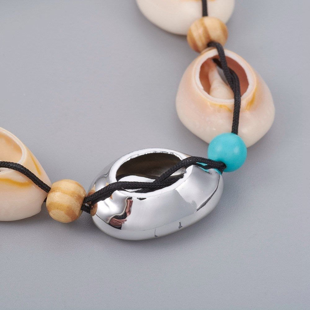 Armbånd med muslingeskaller, sølv - Urma.dk