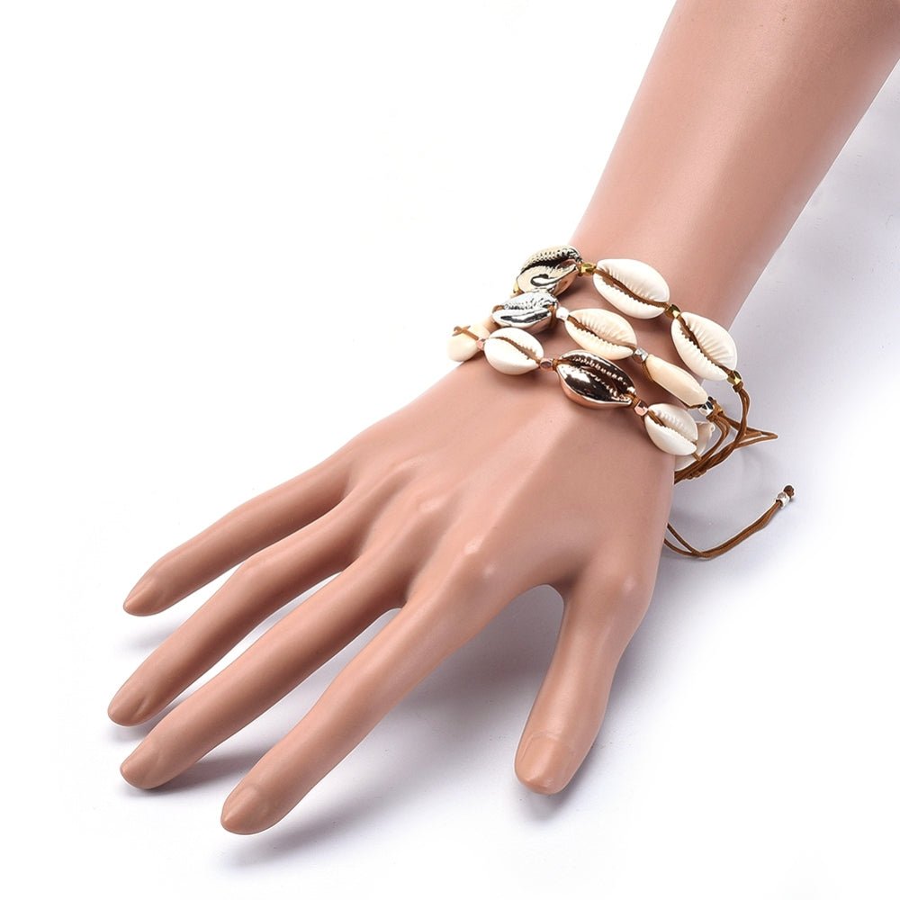 Armbånd med muslingeskaller, sølv eller forgyldt - Urma.dk
