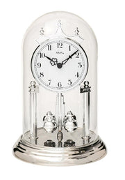 Årsur i rundt glas kuppel med sorte tal. - Urma.dk