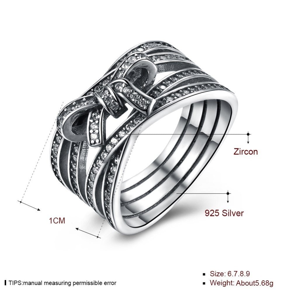 Bred sølv ring med sløjfe - Urma.dk