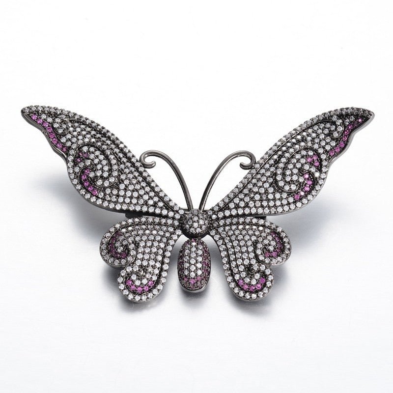 Broche, sort sommerfug med zirconia - Urma.dk