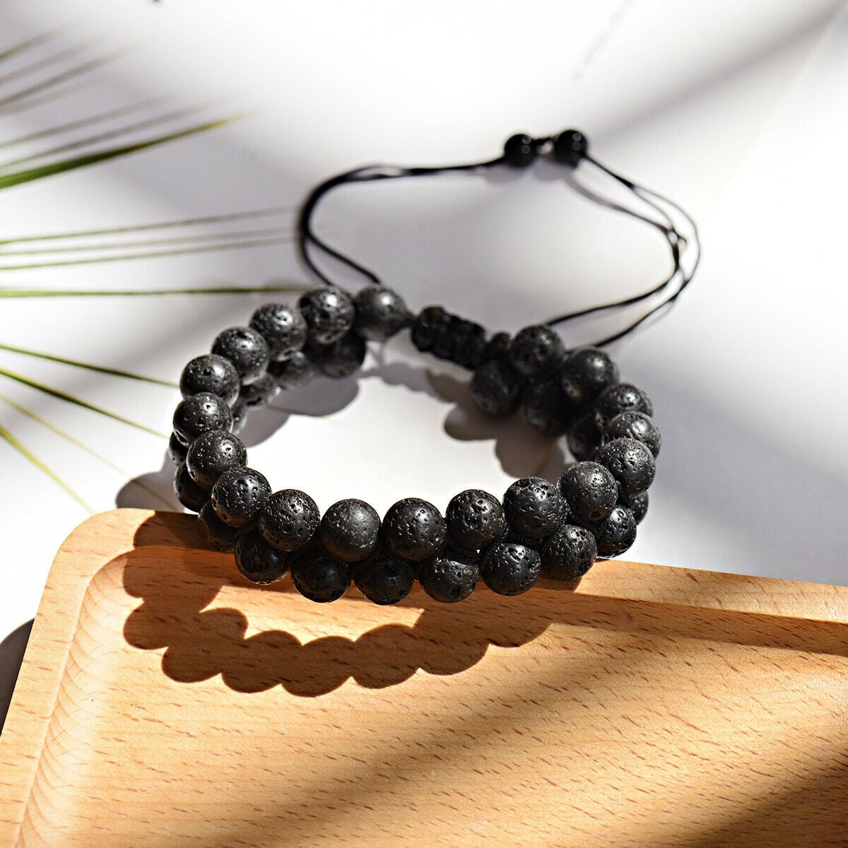 Flettet armbånd, 2 rækker med lavasten - Urma.dk