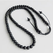 Flettet halskæde med lava stene. - Urma.dk