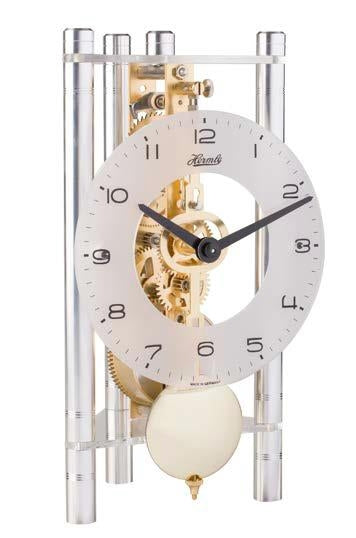 Bordur, mekanisk, dekorativ med synlig urværk og pendul.