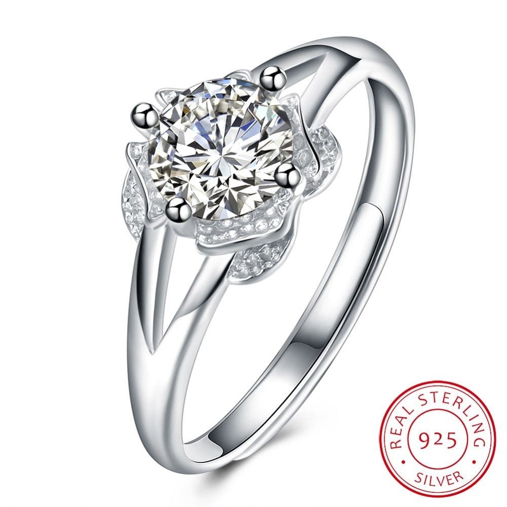 Sølv ring med blomst med zirconia sten - Urma.dk