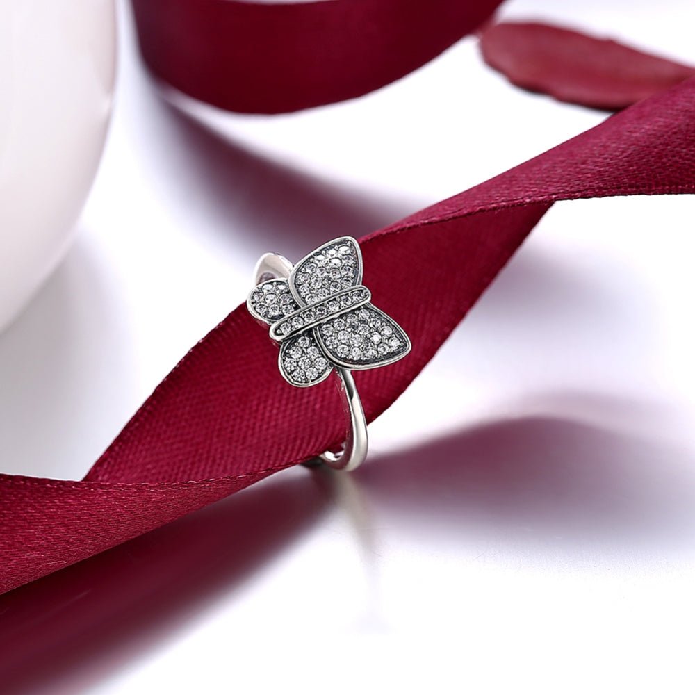 Sølv ring med sommerfugle med zirconia - Urma.dk