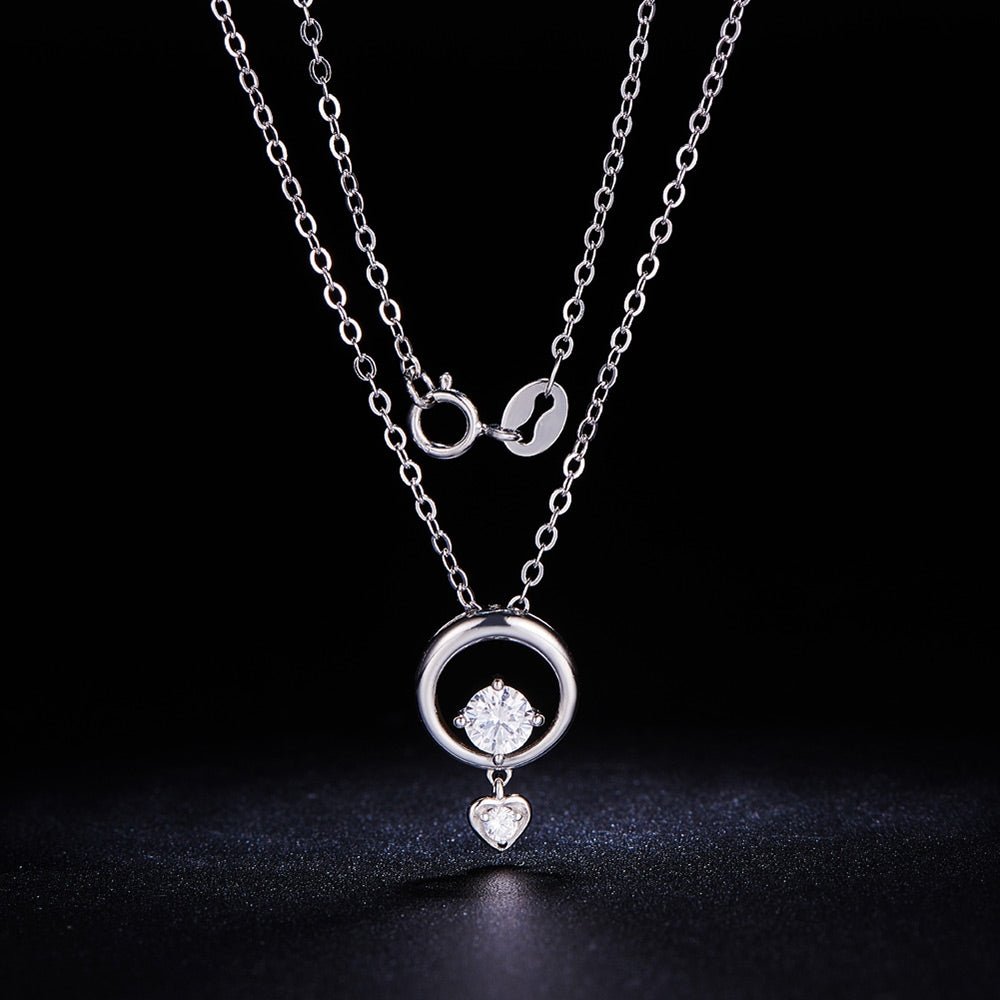 Sølv vedhæng med cirkel og hjerte og zirconia - Urma.dk