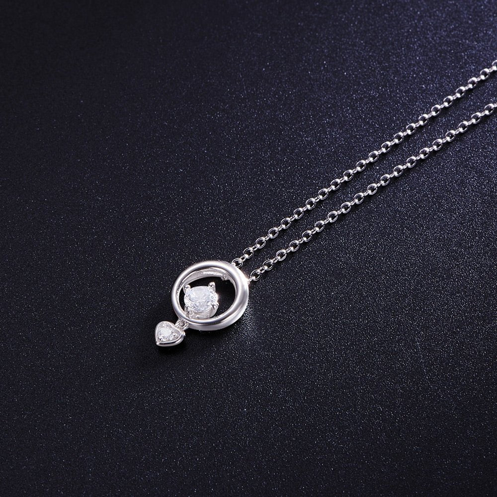 Sølv vedhæng med cirkel og hjerte og zirconia - Urma.dk