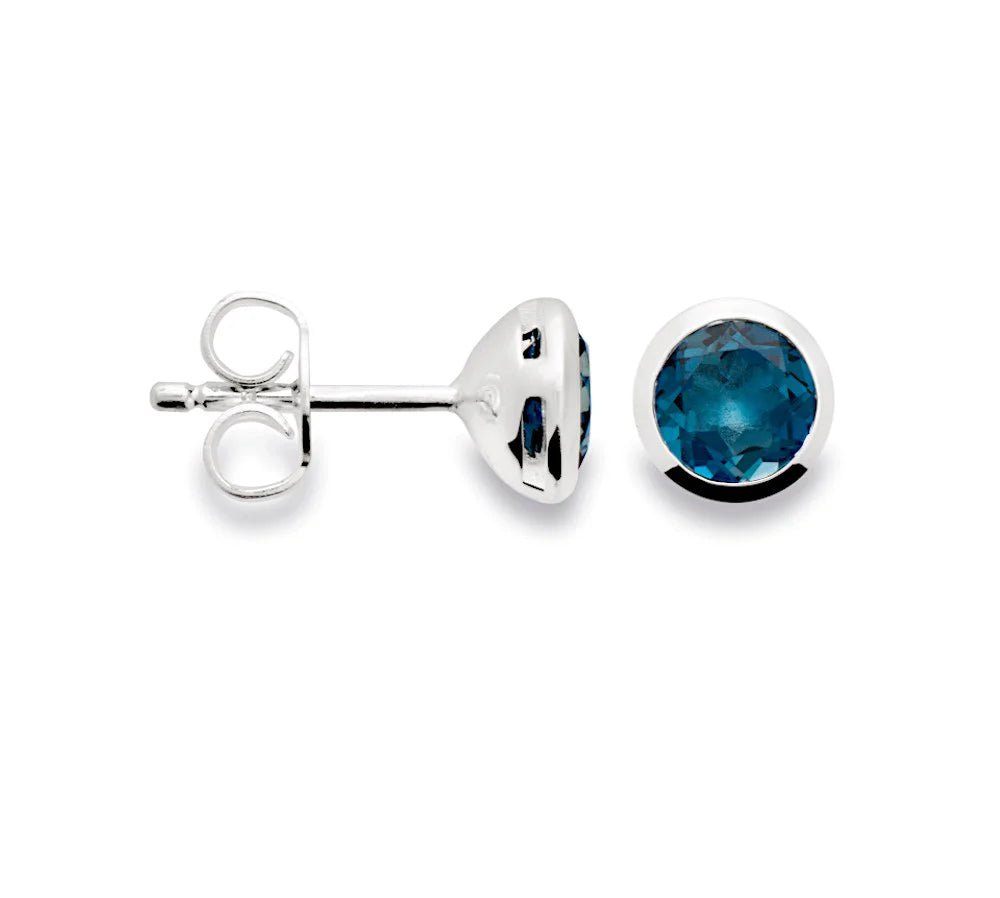 Sterling sølv Ørestikker blank, topas London Blue 1.24ct - Urma.dk