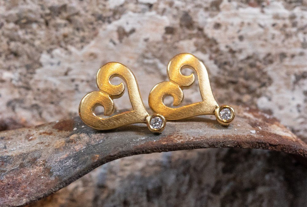 Sterling sølv Ørestikker, matfg, br 0,02ct W - SI - Urma.dk