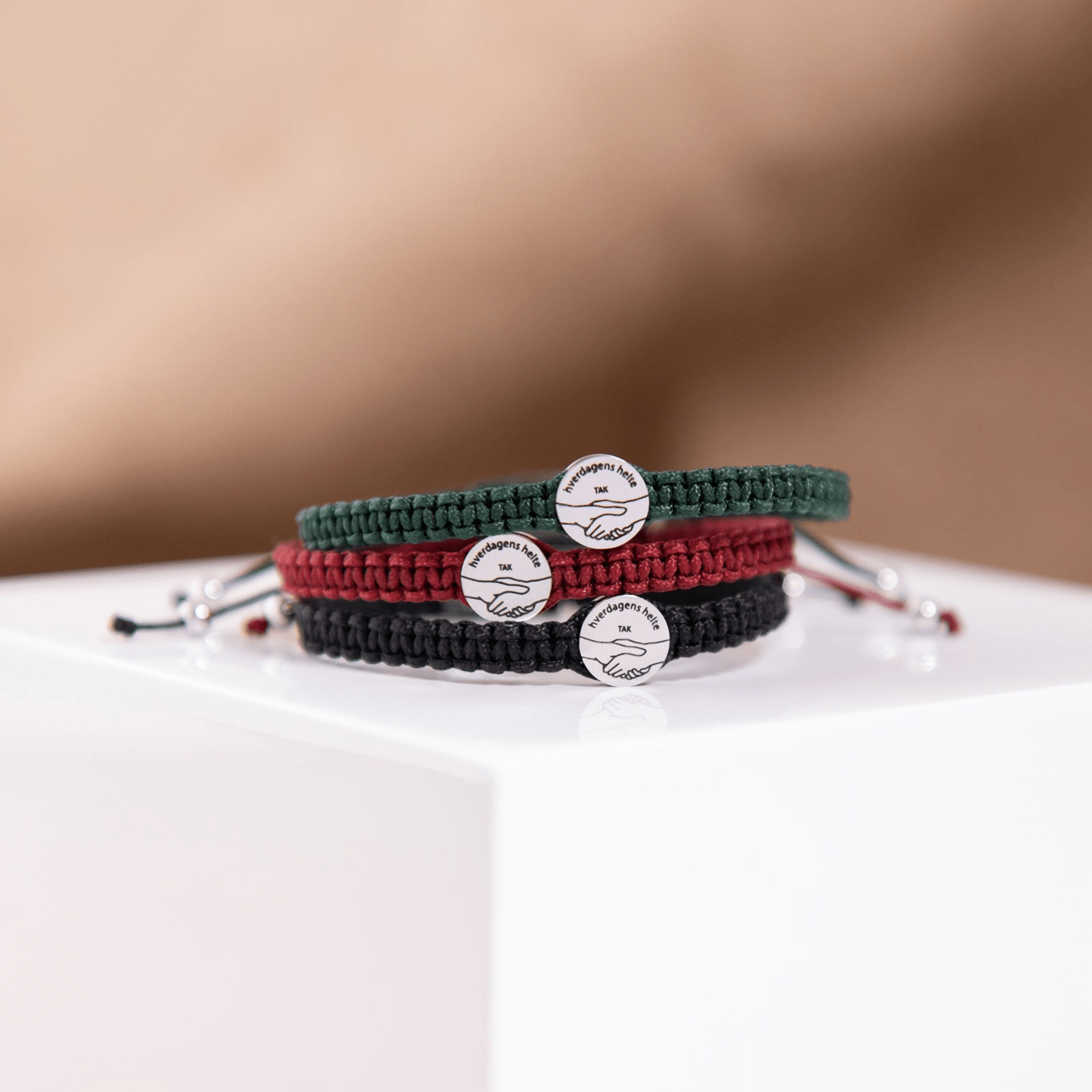 Takkearmbånd, dame, sort - Urma.dk