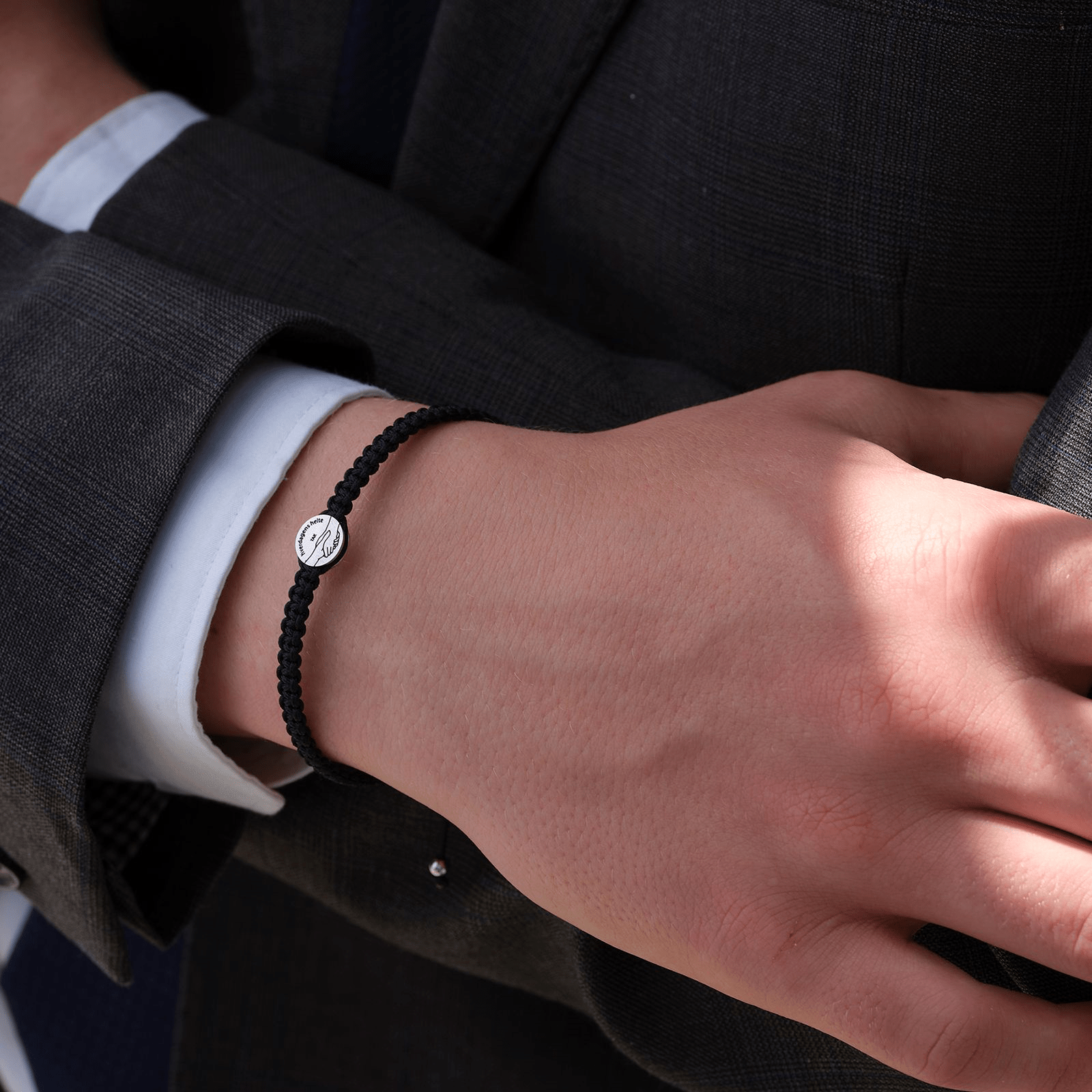 Takkearmbånd, herre, sort - Urma.dk